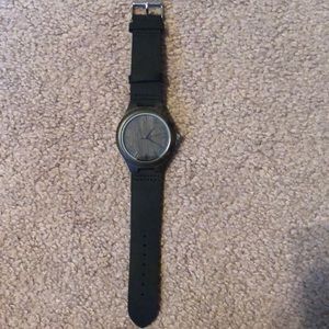 Watch with “wood” like face and black band